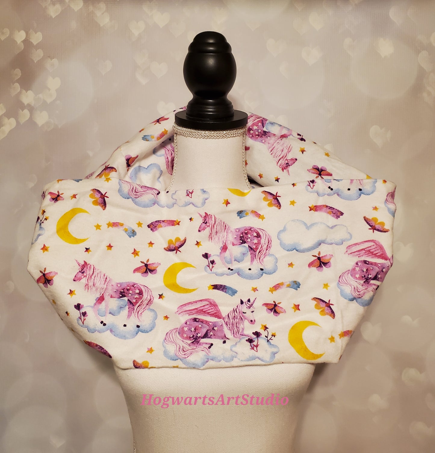 white purple and pink unicorn fabric close up