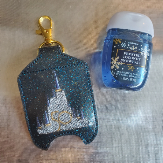 Blue Glitter 50th Castle Hand Sanitizer Holder Keychain - holds an included 1 oz. B&BW bottle!