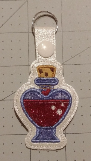 Love Potion Bottle Keychain - pink glittery potion that you'll love