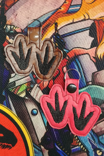 Raptor Dinosaur Footprints Keychain - Jurassic Paleontology