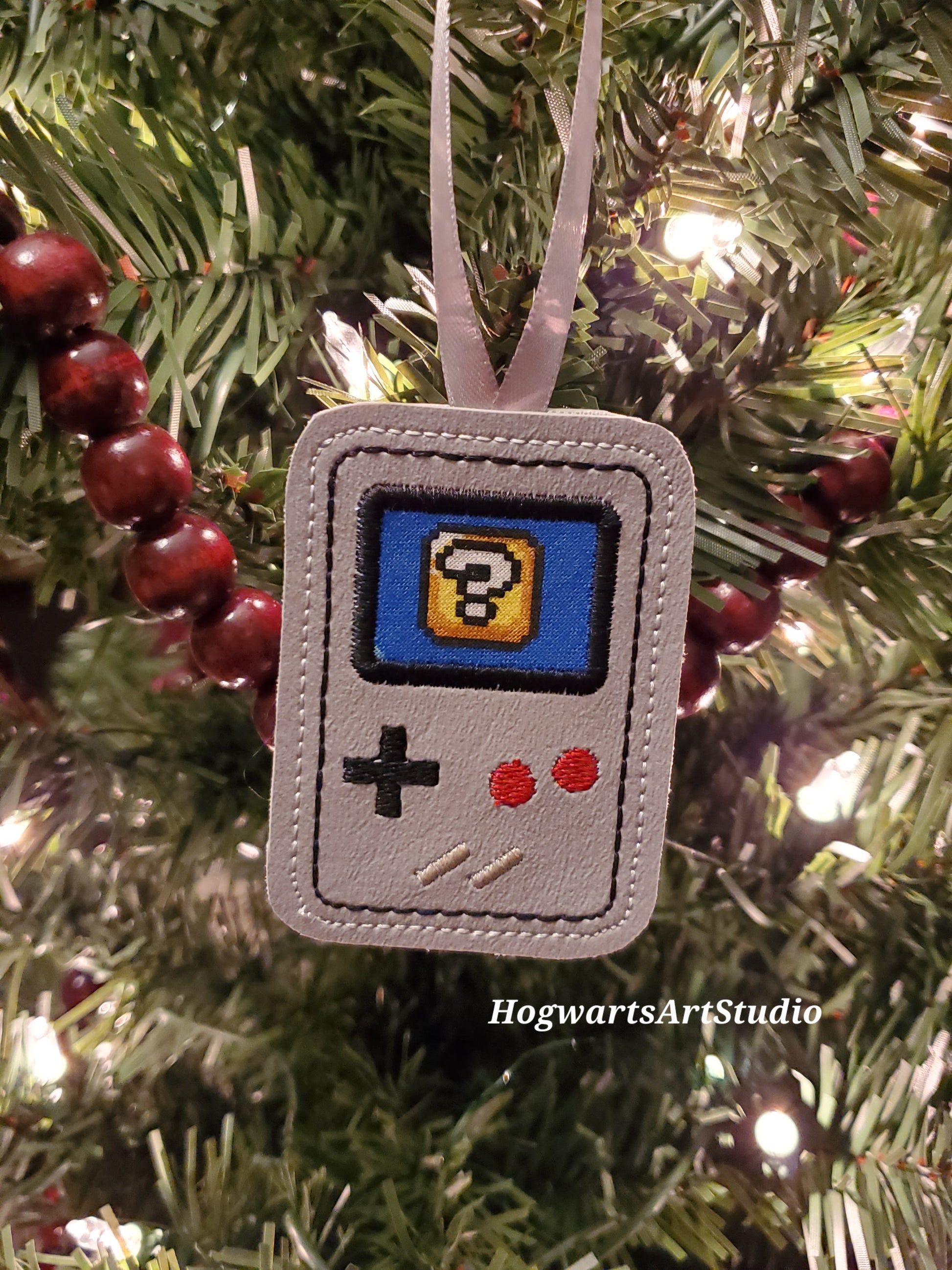 game console ornament on a tree