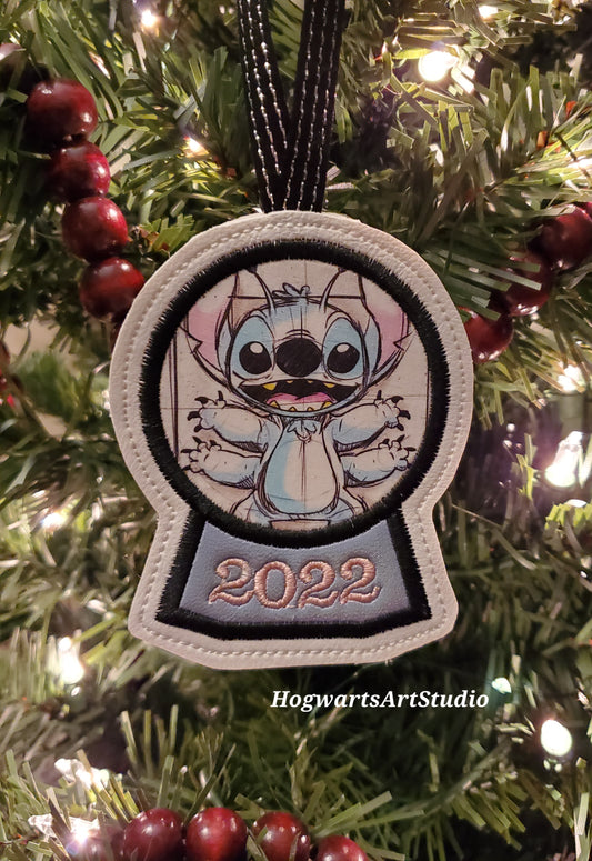 Experiment 626 Snowglobe Ornament- grab this ornery alien before he gets away!