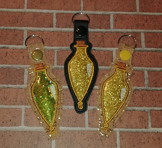 Lucky Gold Potion Bottle Keychain