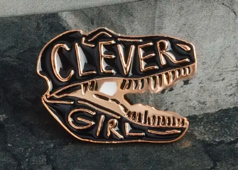 "Clever Girl" Raptor Pin - Jurassic Era Predator Skull